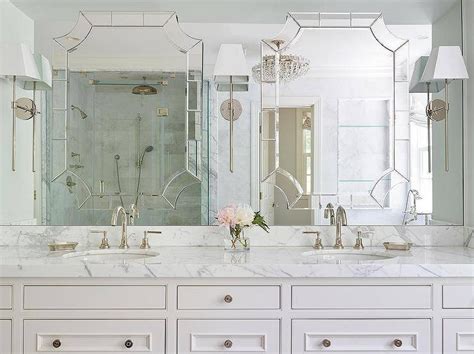 The marble backsplash gets a special touch with a custom curve. 15 Ideas of Custom Bathroom Vanity Mirrors