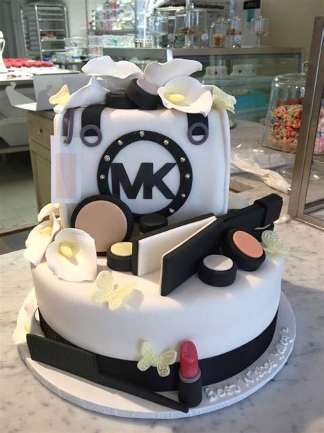 We love creating edible works of art that not only look amazing but each and every one of our cakes is customised to suit you, from the flavour of each tier to the final visual design. Pin by Nadia Powell on Bake: House of Cakes | Make up cake, Michael kors cake, Hairdresser cake