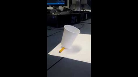 The cup is falling over. Cup falling over - YouTube