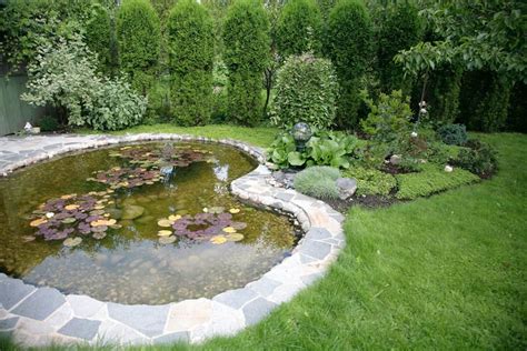 Set up your pond next to a fence, and include a covered seating area. 60 Backyard Pond Ideas (Photos)