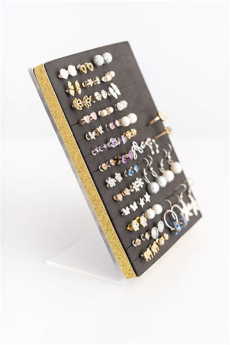 I have so many, prob pushing close to 60 pairs. Post Earring Holder Gold Glitter Ribbon Stud Earring ...