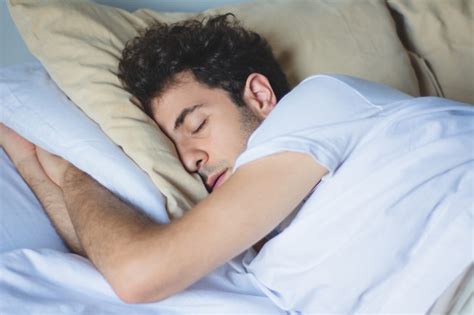 Premium Photo Man Sleeping In Bed