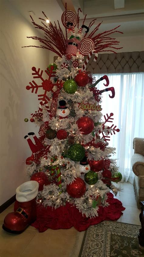 A White Christmas Tree With Red And Green Ornaments
