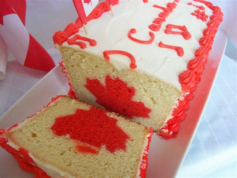 Once your canada day cake is ready, cover the finished product with cool whip and adorn the creation with your very own strawberry flag design. O Canada Day Cake