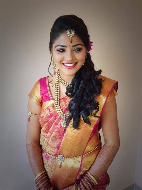 Front puff hairstyle for bun this hairstyle is nothing short of a dream! Simple trending South Indian bride hairstyle to try on wedding. Beautiful hairstyles to try on ...