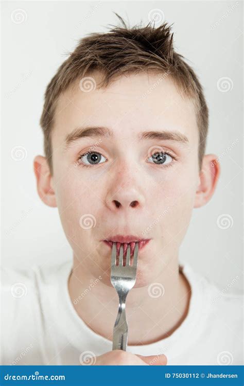 Handsome Boy With Dark Brown Hair And Fork Stock Photo Image Of Child