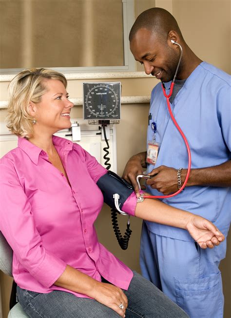 Free Picture Woman Blood Pressure Examination