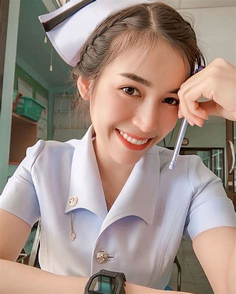 Asian Nurse In Sailor Uniform With Cell Phone