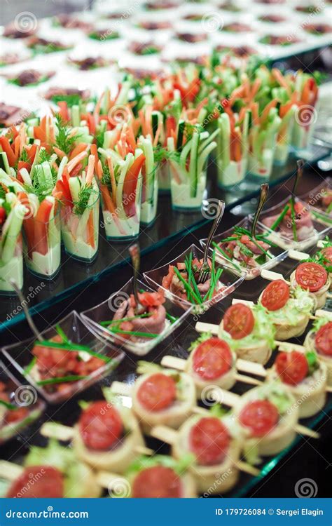 Catering Banquet Table With Salads And Cold Snacks Stock Photo Image
