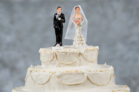 Figurines Of The Bride And Groom On A Wedding Cake Stock Photo