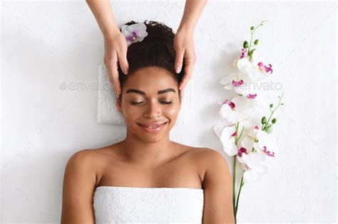 Top View Of Joyful Black Woman Getting Head Massage Stock Image Everypixel