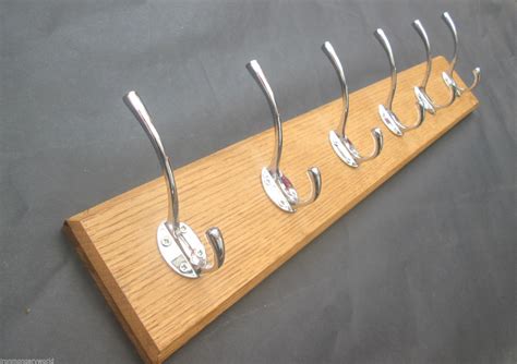 Our handmade wooden black walnut wall hooks will optimize the clean lines of your contemporary home. Solid Reclaimed Oak Wooden Hat and Coat Hooks Hanger Pegs ...