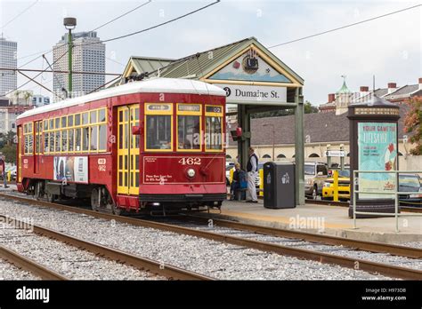 Passengers Board An Rta Streetcar At The Dumaine Street Station On The Riverfront Line In New