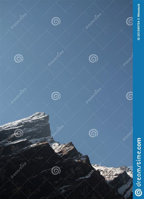Majestic Shot Of A Jagged Rocky Peak Of An Annapurna Mountain Range In