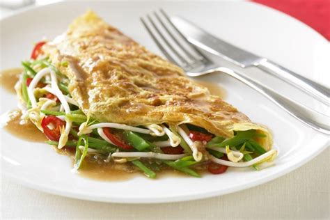 This cheesy omelette is stuffed with buttery garlic mushrooms. Chinese omelette
