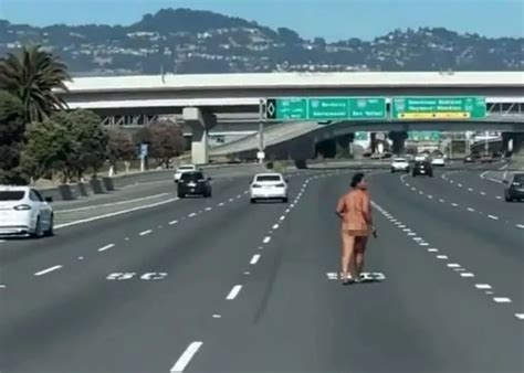 Moment Naked Woman Gets Out Of Car Then Opens Fire On Busy Bridge