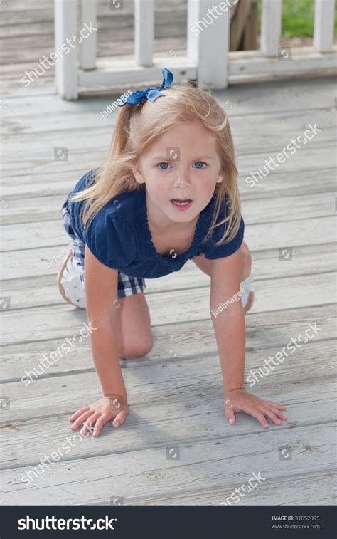 Cute Little Girl Bending Down On Stock Photo 31652095 Shutterstock