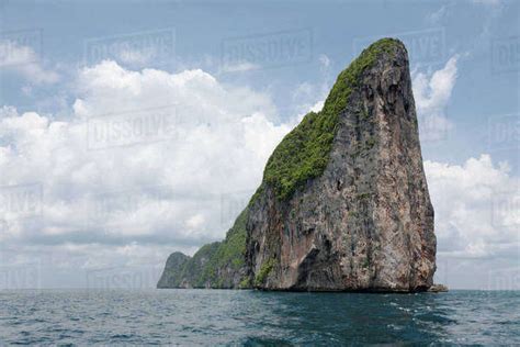 Large Rock Formation In Ocean Stock Photo Dissolve