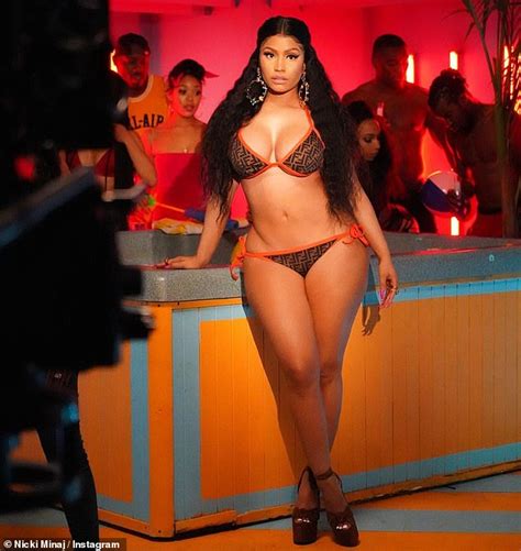 Nicki Minaj Flaunts Curvy Figure In A Bodycon Fendi Dress For A Steamy