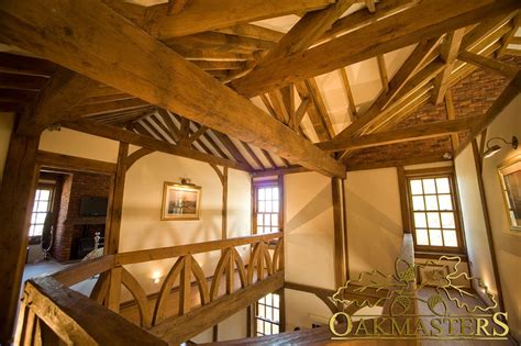 There's hardly a more controversial design element out there. King post trusses and open vaulted ceilings - Oakmasters
