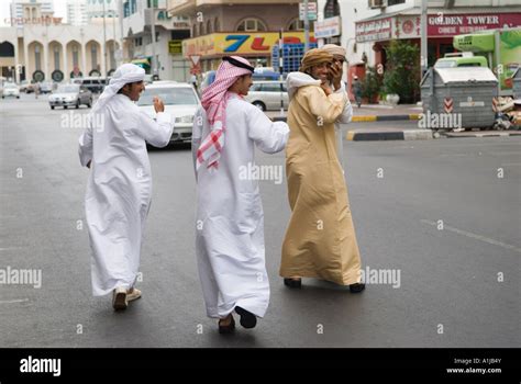 Abu Dhabi United Arab Emirates Uae Young Arab Men In Their Traditional