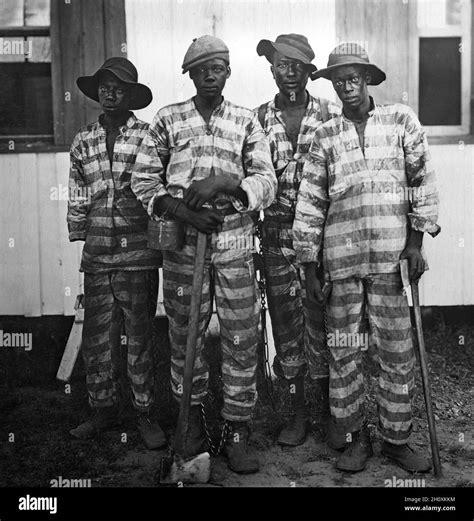 Striped Convict Uniforms Black And White Stock Photos And Images Alamy