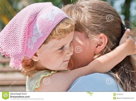 Little Girl Hugging Her Mother S Neck Smiling Stock Image Image Of