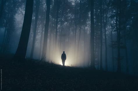 Mysterious Haunted Forest At Night With Dark Man