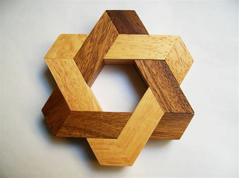 Japanese artisans made the most beautiful and complicated wooden puzzle boxes long time ago. Image result for 3 d magan david puzzles | Wood puzzles ...