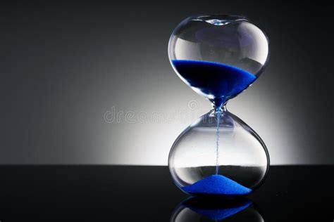 Transparent Hourglass With Blue Sand Stock Image Image Of Hourglass