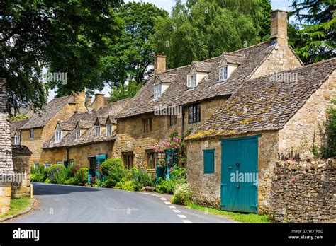 Stone Cottages In The Village Of Snowshill In The Cotswolds England