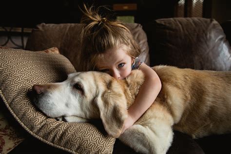 Girl Snuggling Her Dog By Dana Leigh Click Magazine