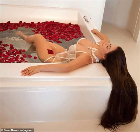 Demi Rose Flaunts Her Ample Assets In Sheer White Lingerie As She Soaks In A Bath Of Rose Petals