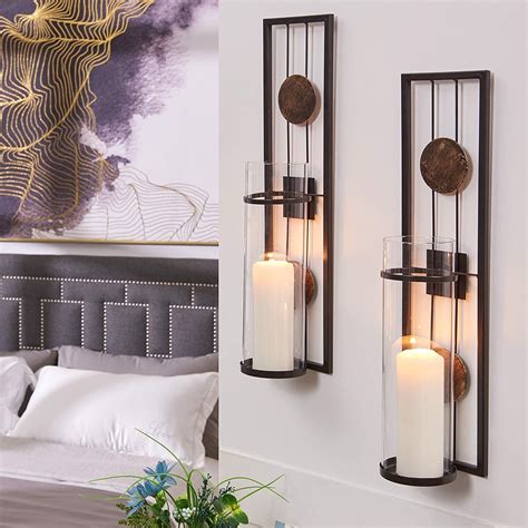 The most common metal candle wall sconce material is metal. Danya B Set of Two Wall Sconces, Metal Wall Décor, Antique ...