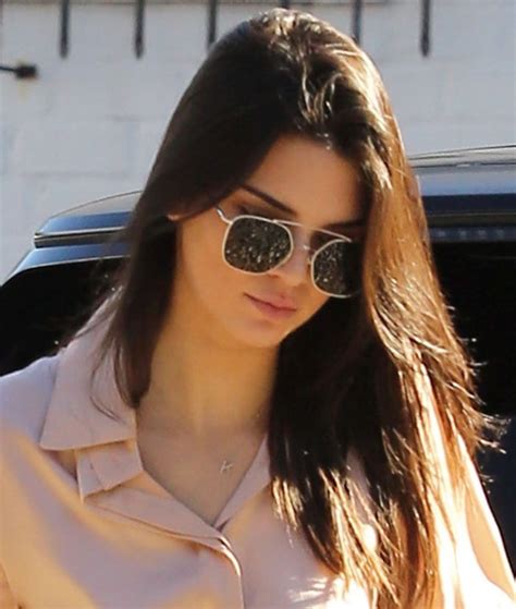 kendall jenner flashes slim legs in acne odessa boots