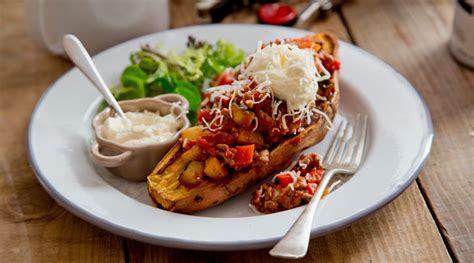 Perfectly baked sweet potatoes have a deliciously soft, sweet, and fluffy inside with a crispy flavorful outside. Baked Sweet Potatoes Stuffed with Chilli - SuperValu