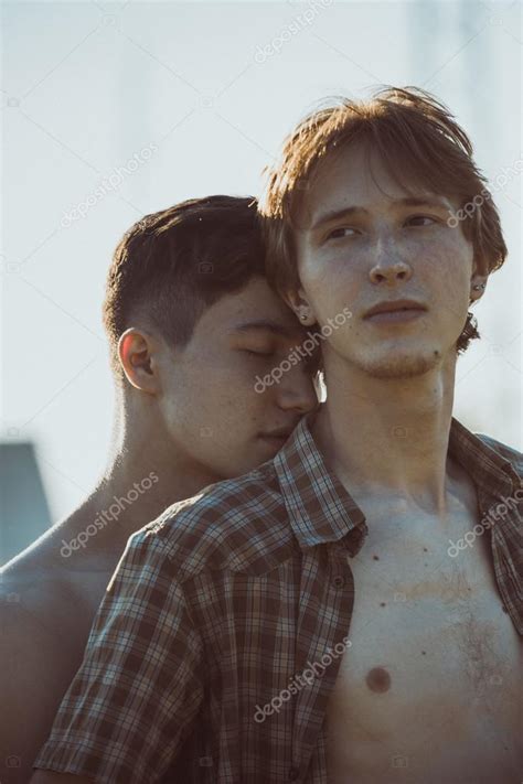 Portrait Of A Happy Gay Couple Outdoors Stock Photo By Ruslan