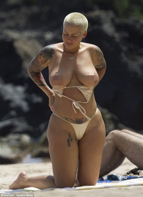 Topless Amber Rose Suns Herself In A Thong Bikini On Hawaiian Beach Getaway Daily Mail Online