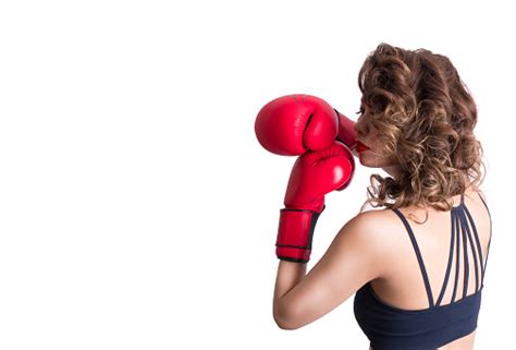 Woman Wearing Boxing Gloves Punching Stock Photo Download Image Now