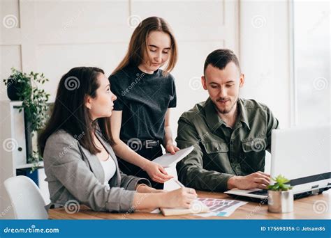 Business People Collaborating On Project In Office Stock Photo Image