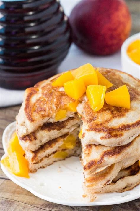 In a large bowl, sift together the flour, baking powder, salt, and sugar. Brown Sugar Peach Pancakes Recipe - Oh Sweet Basil