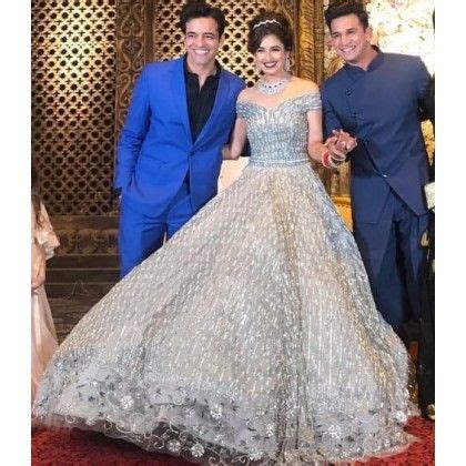 Their mehndi ceremony was not less than a shiny affair which followed by an engagement ceremony! Yuvika Chaudhary In Silver Reception Wear Floor Length Off ...
