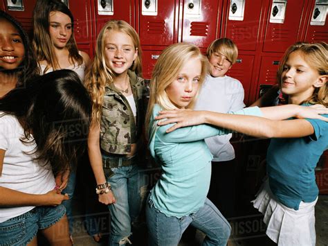 Girls Posing In School Locker Room Portrait Stock Photo Dissolve