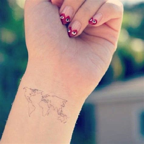 World Black Map Tattoo On Arm
