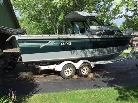 A boat with an engine. Used Walleye Boats for Sale - Classified Ads