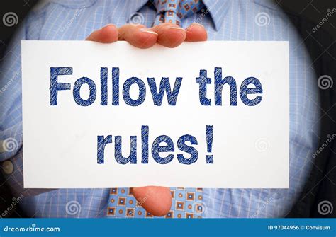 Follow The Rules Manager Holding Sign With Text Stock Photo Image