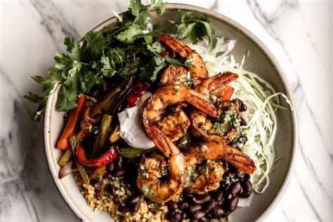 shrimp fajita bowl with quinoa cooking with cocktail rings