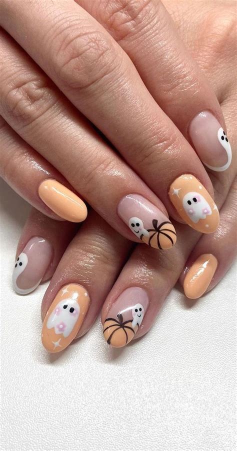 50 Cute Spooky Halloween Nail Ideas Soft Peach Spooky Nails 1 Fab