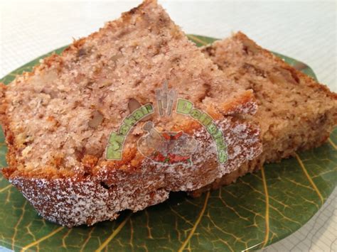 This homestyle cake is a family recipe made of two soft banana layers loaded with black walnuts. Makan Delights: Banana-Walnut Cake