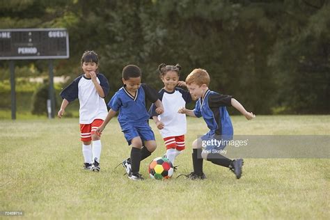 Children Playing Soccer Outdoors Foto De Stock Getty Images